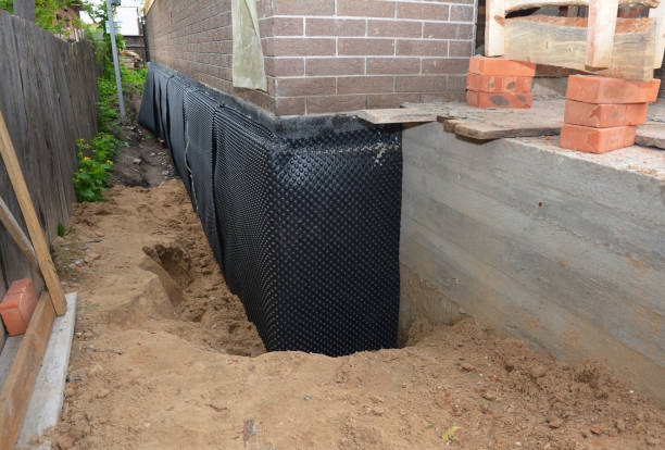 Happy homeowners after waterproofing job in La Grange